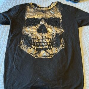 Buckle skull black top sz large. Open back.